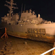 USS John S. McCain sits aboard MV Treasure as it is prepared to sail to Japan for repairs. The extent of the damage can be seen. USN photo.